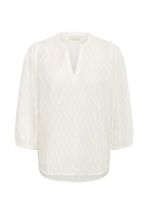 Bluză albă semi-transparentă cu un model texturat subtil, gât rotund cu decupaj în V, mâneci lungi bufante și manșete elastice.
