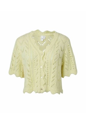 Cardigan tricoté jaune pâle à manches courtes, avec bords festonnés, boutonné devant et motif ajouré en forme de feuilles.
