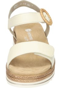 Beige sandalen met twee brede banden, een geweven accent aan de zijkant en een gevoerd voetbed. Textuurzool met een lichte hak.