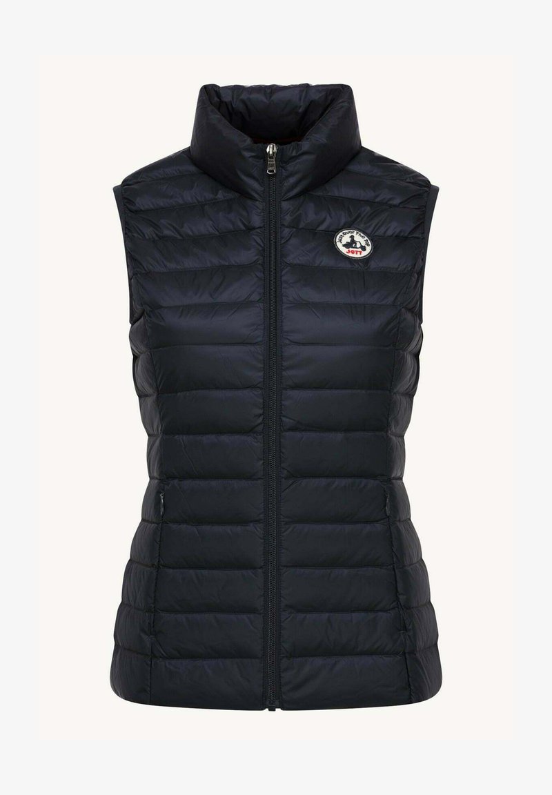 Zwarte puffervest met een hoge kraag, rits aan de voorkant en horizontaal gestikte patroon; heeft een ronde logo patch op de linker borst.