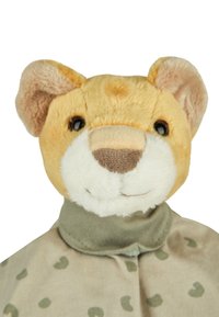 Plush lion toy with a soft yellow and cream face, wearing a green collar and a beige body with green polka dots.
