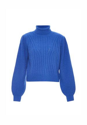 Pull cropped bleu royal avec col roulé, texture côtelée et manches bouffantes volumineuses. Présente des lignes verticales et des découpes subtiles.