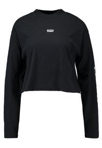 Czarna, krótka bluzka z długim rękawem, wykonana z bawełny, z małym logo Levi's na piersi, o gładkiej fakturze i lekko luźnym kroju.