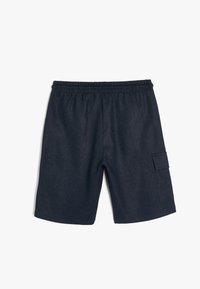 Mørkeblå shorts med elastisk talje og en sidelomme med cargo-design. Lavet af struktureret stof, designet for komfort og funktionalitet.