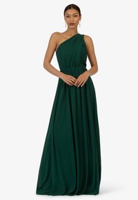 Maxikleid in Dunkelgrün mit einem schulterfreien Träger und dramatischer Raffung an der Taille, aus weichem, leicht fließendem Stoff.