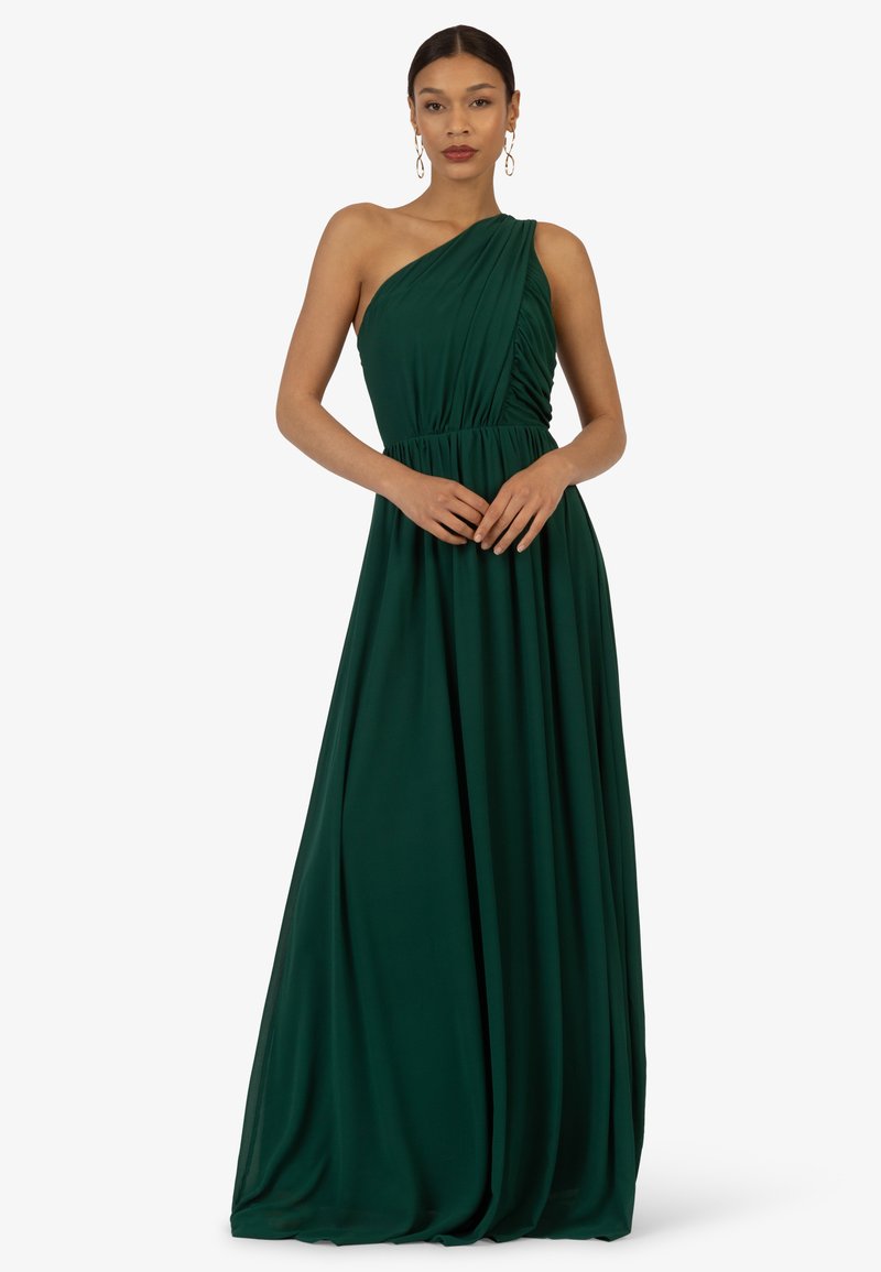 Maxikleid in Dunkelgrün mit einem schulterfreien Träger und dramatischer Raffung an der Taille, aus weichem, leicht fließendem Stoff.