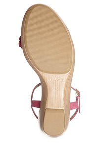 Pink sandal with a textured rubber sole, featuring a wooden-like midsole, adjustable strap, and a smooth footbed.