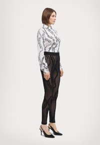 Versace Jeans Couture CO TAPE - Pajkice – hlače - black