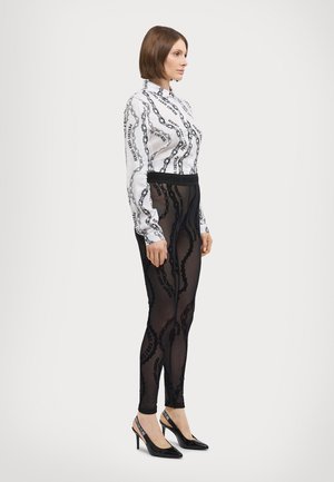 CO TAPE - Legging (type pantalon) - black