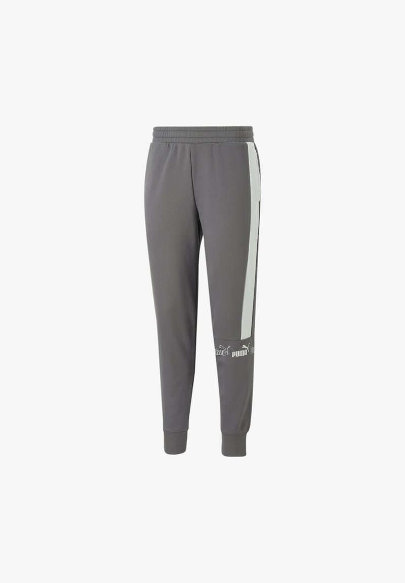 Pantalones deportivos grises con rayas laterales blancas, cintura elástica, piernas ajustadas y un logo en la parte inferior de la pierna. Hechos de una tela suave.