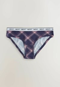 Culottes pour femmes à carreaux bleu marine et rose avec une ceinture élastique blanche répétant le logo "NEXT", posées à plat sur un fond clair.