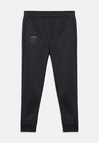 Μαύρο αθλητικό παντελόνι με ελαστική μέση και ετικέτα με το λογότυπο της Paris Saint-Germain στο πάνω αριστερό μηρό.