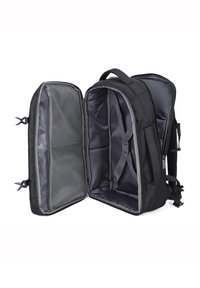 Zaino nero con design aperto, dotato di due scomparti, tasche in rete e spallacci imbottiti regolabili. Interno grigio.