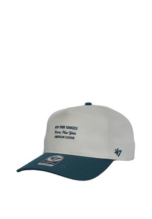 White and teal adjustable baseball cap with "New York Yankees Bronx, New York American League" text and '47' logo on the side.