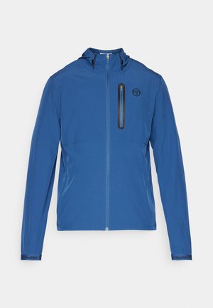 Blue lightweight jacket featuring a zippered front, adjustable hood, side pockets, and a small chest pocket with a black zipper.