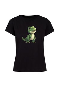 Black cotton t-shirt featuring a green cartoon dinosaur design on the front, with a large head and small limbs. Short sleeves and crew neck.