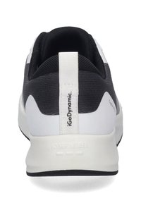 Czarno-biały but sportowy z teksturowaną cholewką, amortyzowaną podeszwą i białą pętlą z logo na pięcie.