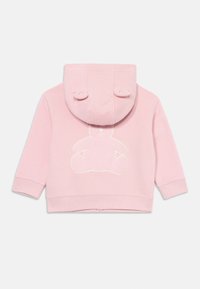 Felpa in cotone rosa con grafica di un orso sul retro, rifinita con orecchie sul cappuccio e polsini a costine sulle maniche e sull'orlo.