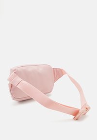 Tommy Hilfiger ESSENTIAL BUMBAG UNISEX - Bältesväska - soft rose