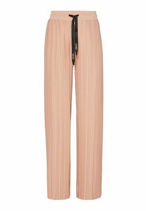 Pantaloni plissettati color pesca con vita elastica e cordino nero. Presentano una vestibilità rilassata e sottili righe verticali.
