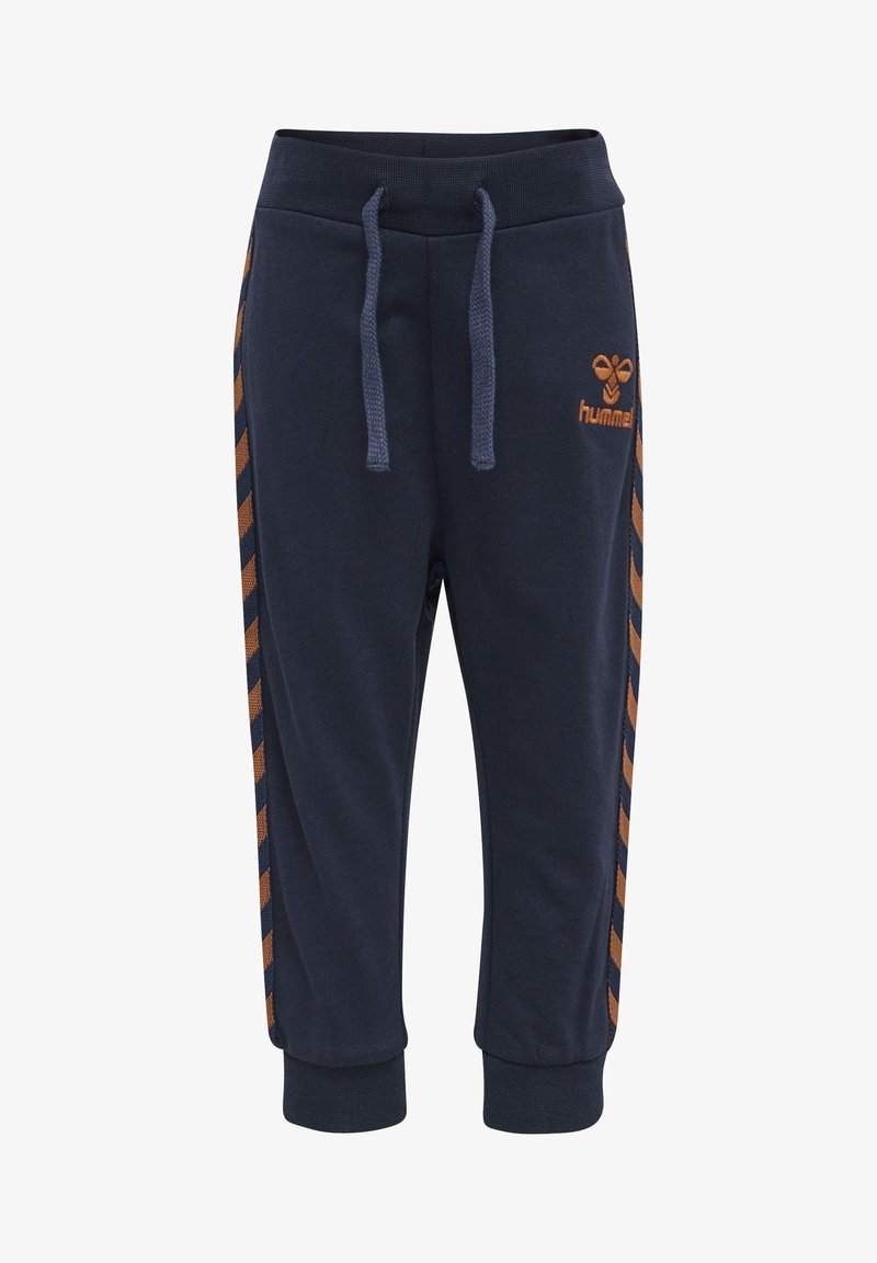 Marineblauwe sweatpants van katoen, met een elastische tailleband voorzien van trekkoorden en oranje chevronstrepen langs de zijkanten.