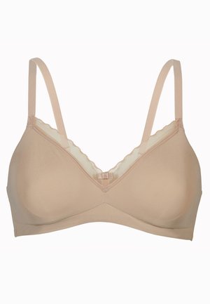 Reggiseno wireless beige con spalline regolabili, rifinito con pizzo a onde lungo il collare e texture di tessuto morbido. Design classico a forma di V.