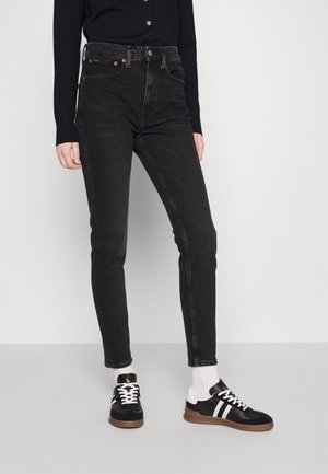 HIGH RISE ANKLE - Oprijete (skinny) kavbojke - parker wash