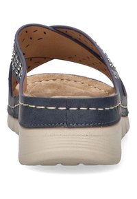 Sandalo scivoloso blu navy con fascia incrociata, strass decorativi e una soletta imbottita color beige. Suola in gomma di colore chiaro.