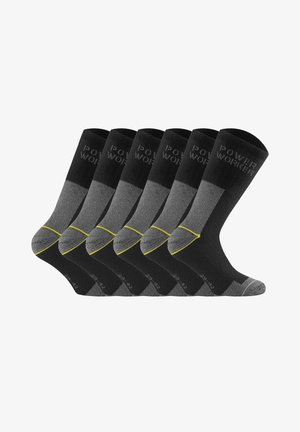 Sechs Paare schwarze und graue Crew-Socken mit gelben Akzenten und dem Schriftzug "POWER WORKER" am Bündchen, nebeneinander dargestellt.