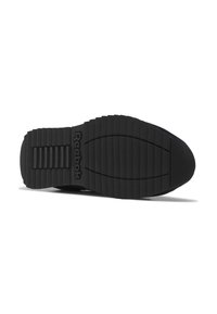 Semelle de chaussure en caoutchouc noir avec des rainures texturées, des crêtes et le logo Reebok affiché en évidence. Design plat pour une adhérence et une stabilité optimales.