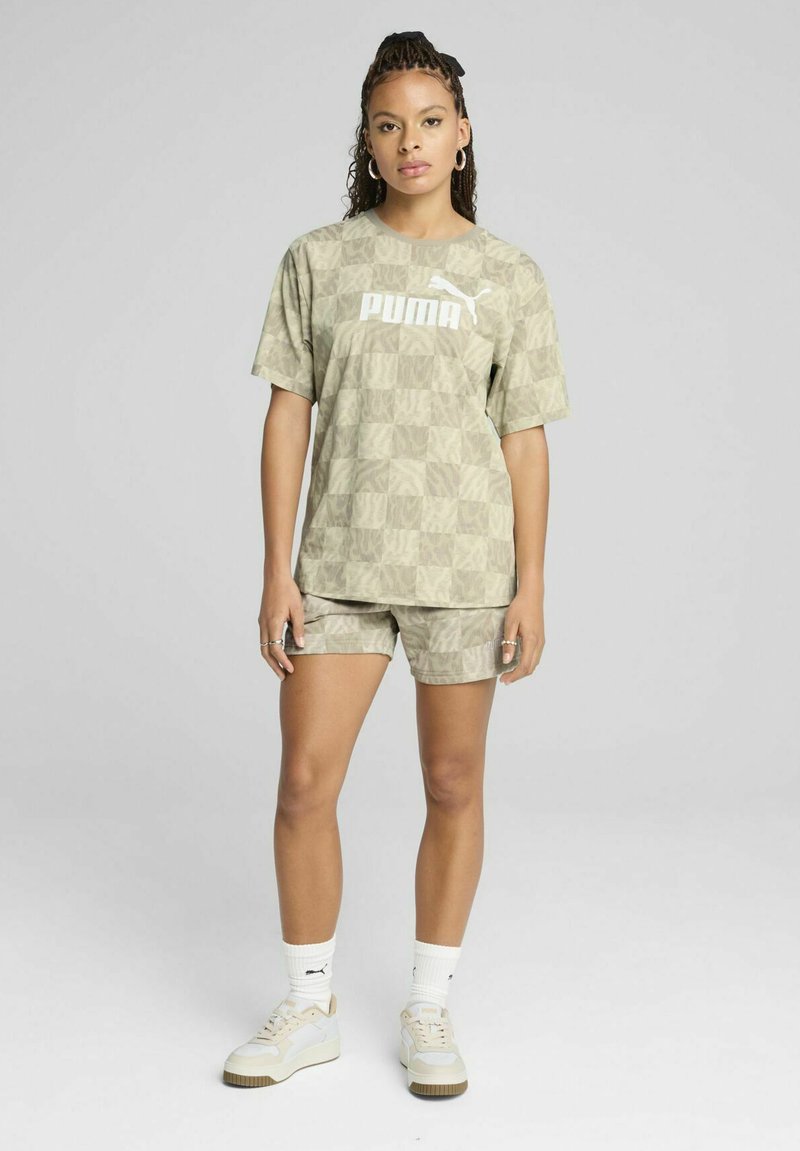 Puma ESS GRAPHIC MID-RISE - Teplákové kalhoty - alpine snow