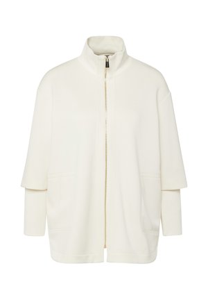 Biała kurtka zapinana na zamek błyskawiczny z wysokim kołnierzem, z warstwowymi krótkimi rękawami na długich rękawach, z przednimi kieszeniami i złotym zamkiem.