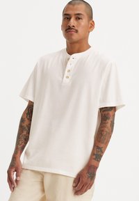 Levi's® BUTTON HENLEY - Pamata T-krekls - cloud dancer