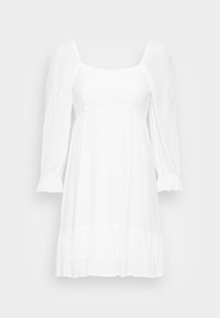 Vestido branco com decote quadrado, mangas bufantes longas e corpo texturizado. Apresenta uma saia fluida e punhos de mangas com babados.