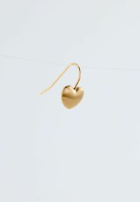 Gold heart-shaped earring with a brushed texture, featuring a curved hook for attachment. Simple, minimalist design without additional accents.