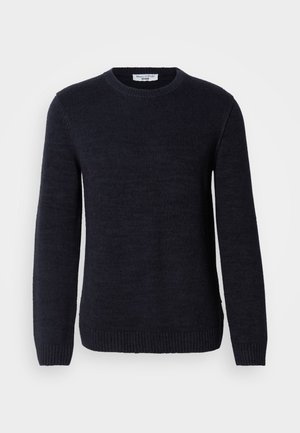 Navy blue wool sweater with a crew neck, ribbed cuffs, and hem. Smooth texture with no visible patterns or accents. Simple, classic design.
