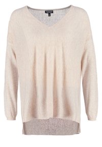 Jasnobeżowy sweter z dzianiny z dekoltem w serek, długimi rękawami, prążkowaną fakturą i zaokrąglonym dołem. Luźny kr�ój z bocznymi rozcięciami.