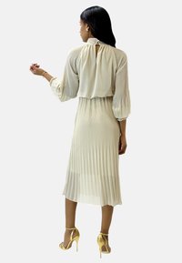 Elara ABAYA beżowy