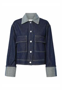 Tumma denimpuku, jossa on vaalean denimin kaulus, kaksi etutaskua ja nepparit. Hihoissa on erottuva kangasta ja ommeltuja kohtia.