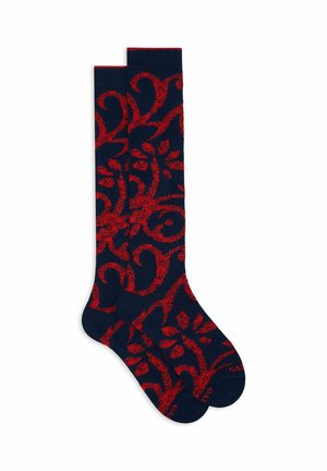 Knee-high socks in navy blue with a red floral and swirl pattern. Soft material with a smooth texture. Ribbed tops for secure fit.