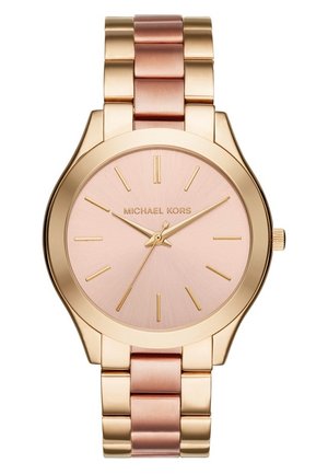 Montre-bracelet Michael Kors en or rose avec un cadran rond, des index horaires minimalistes et un bracelet à maillons métalliques aux tons rose et or.