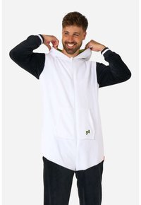Mono de forro polar blanco y negro con cierre de cremallera, capucha y bolsillo frontal. Presenta un detalle del logo en verde y amarillo en el bolsillo.