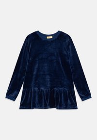 Tummansininen samettitoppi, jossa on pitkät hihat, pyöreä kaula-aukko, gathered-peplum-helma ja ribbireunat. Pehmeä rakenne, sileä loppu.