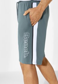 Bench Tracksuit bottoms - hellpetrol