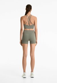 OYSHO STRAPPY BACK - Sportski grudnjak s blagom potporom - khaki