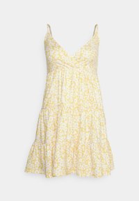 Vestido amarelo floral com decote em V, alças finas, babados em camadas e um tecido leve com um padrão floral branco.
