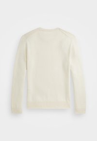 Crèmefärgad stickad tröja med långa ärmar, ribbade muddar och rund halsringning. Har en slät yta och sömlös axeldesign.