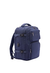 Navy blue backpack made of durable fabric with multiple zippered compartments, adjustable padded straps, and a top carry handle.