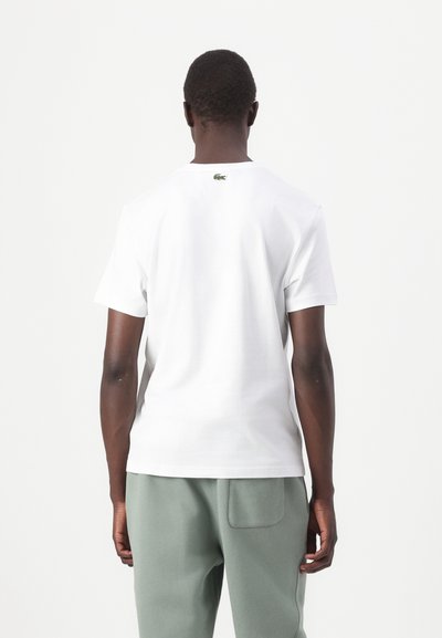 Lacoste Тениска с щампа - white