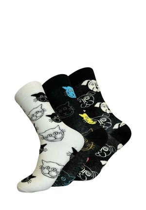 Drei Paar Socken: ein weißes Paar mit schwarzen Katzenköpfen, ein schwarzes Paar mit bunten Akzenten und ein weiteres schwarzes Paar mit Katzen- und Hundegesichtern in verschiedenen Farben.